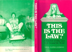 The cover of my 1976 book where I'm seen breaking the law by riding a toy car on the street